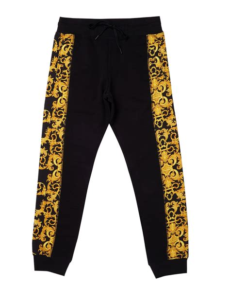 versace sweat|Versace denim pants.